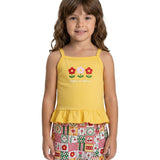 Conjunto infantil regata amarela e shorts-saia malha estampada flores