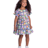 Vestido infantil tricoline roxo estampa selos tropicais