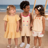 Vestido infantil tecido bordado inglês amarelo-manteiga