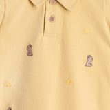 Macacão curto bebê cotton amarelo-manteiga bordado