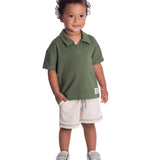Conjunto infantil polo malha texturizada verde e bermuda moletinho linho