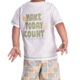 Conjunto infantil camiseta malha off-white estampada e bermuda sarja bege